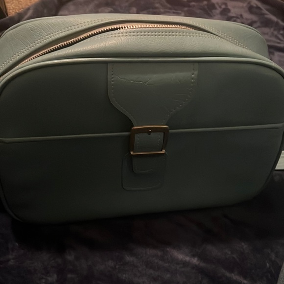Samsonite blue bag